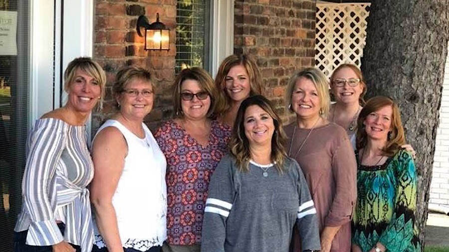 Michelle McCauley (far left) with her team outside of The Haven, an abortion recovery ministry located right next to Toledo's last abortion facility.