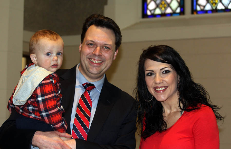 Dr. Zachary Vreeman of First Presbyterian Church with Acacia Boyes and her son, Axton.