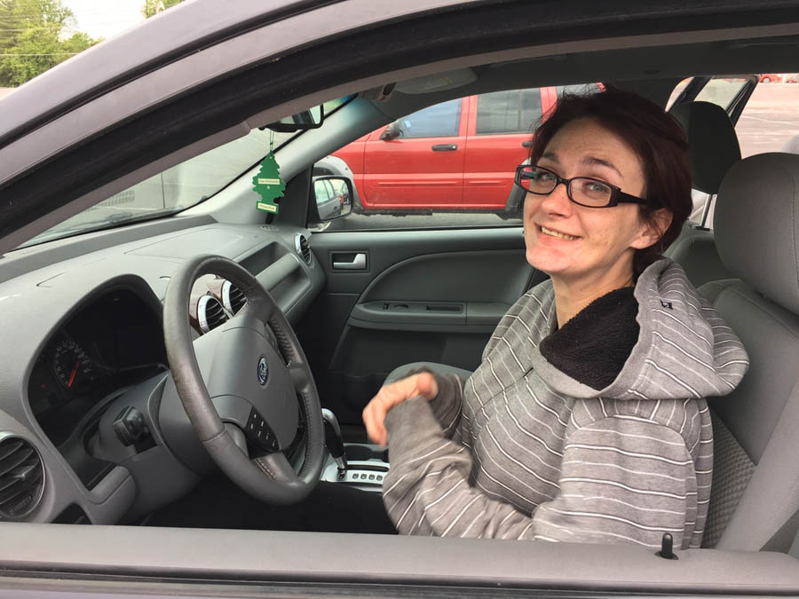 PRC Rolla client Janey, mom of triplets, in her donated car arranged by the center