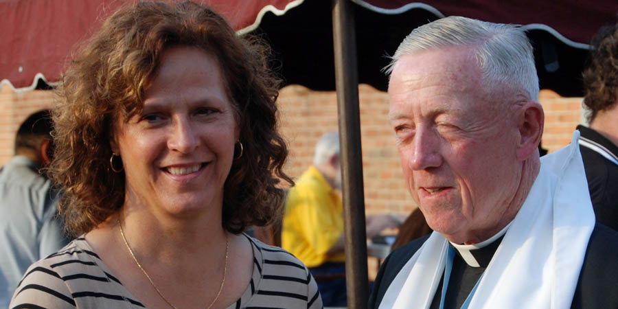 Denise Swett with Knights of Columbus Virginia State Council's Associate Chaplain Rev. John Cregan.