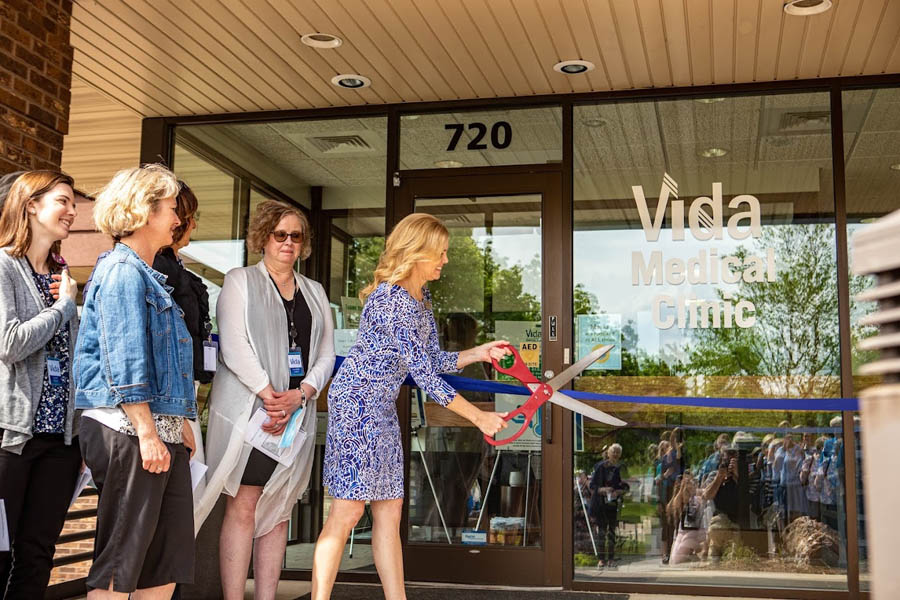 Vida grand opening ribbon cutting with Executive Director Anne Tretinyak and Vida staff