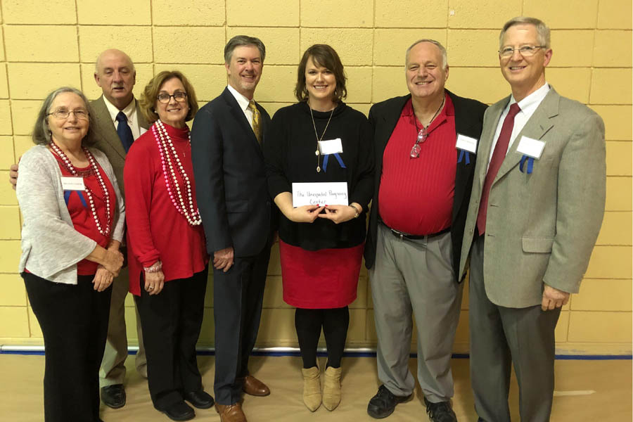 Heartbeat International’s Kirk Walden (center left) presents Brittany Thomson (center right) and board with $15,000 check as part of Life Launch grant for pregnancy center start-ups.