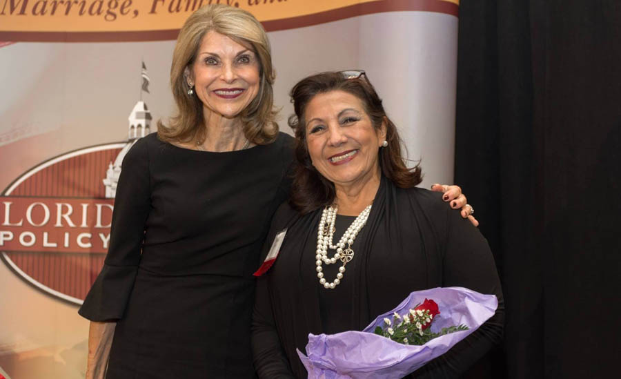 Martha Avila, executive director at Heartbeat of Miami, with Pam Tebow at a banquet honoring pregnancy centers throughout Florida.