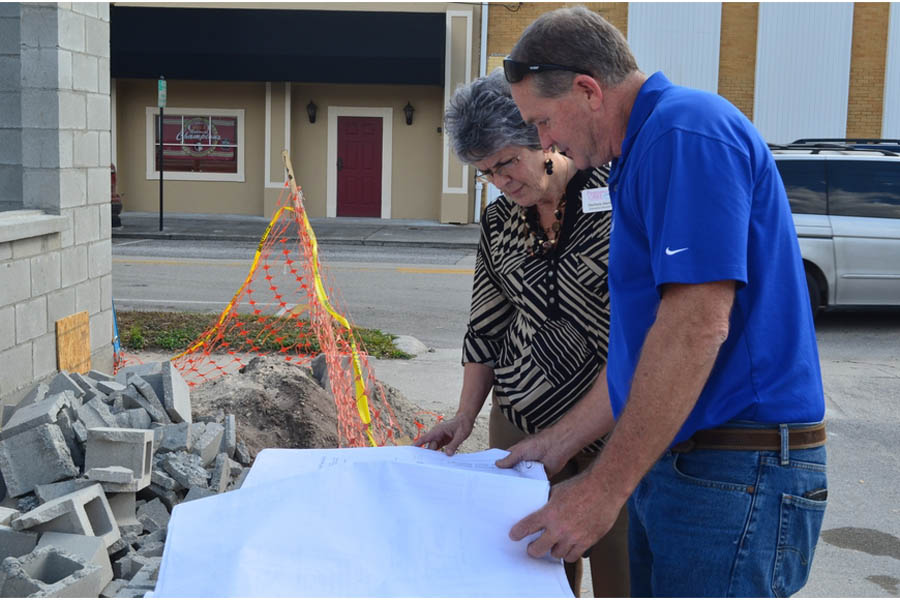 Darlene Davis and Clayton Jenkins look over plans for the center's expansion.