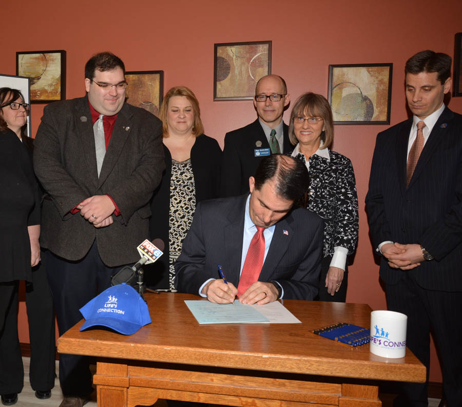 Gov. Scott Walker signs bills defunding Planned Parenthood at Wisconsin pregnancy center, just 400 feet from a Planned Parenthood