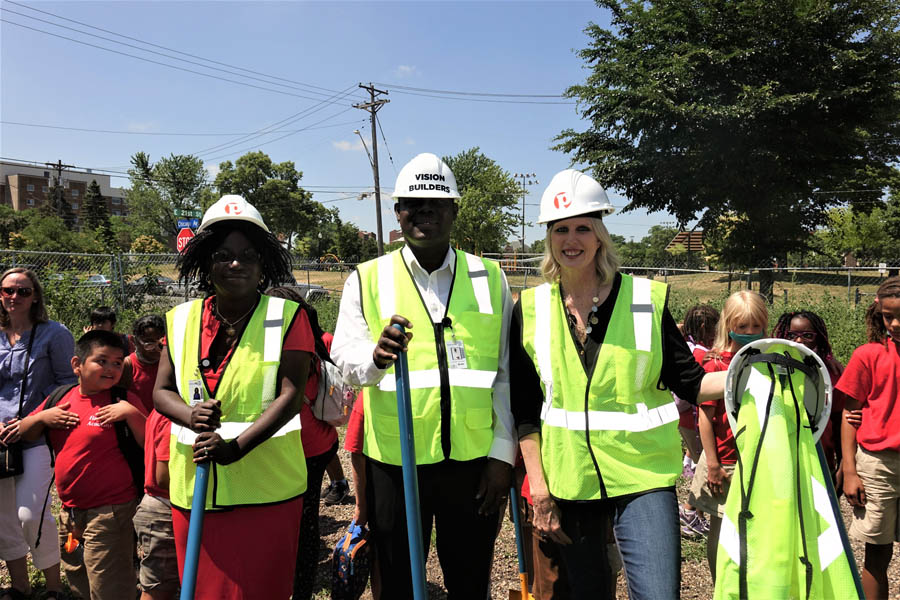 New Life Family Services Executive Director Tammy Kocher stands with Dr. and Mrs. Robert Odam at the site where their two nonprofits will collaborate within one building