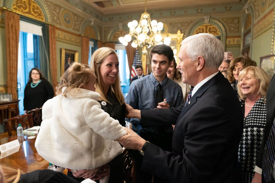 Elisa and her 1-year-old daughter Lissy talk with Vice President Mike Pence ahead of the March for Life.