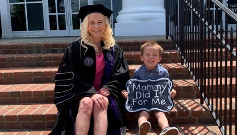 Brittany and son Noah at her recent graduation from pharmacy school