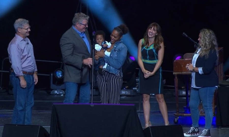 Heartbeat International President Jor-El Godsey, Focus on the Family's Jim Daly, Unplanned Movie Scholarship recipient Dominique and son Dominic, Ashley Bratcher and Embrace Grace's Amy Ford