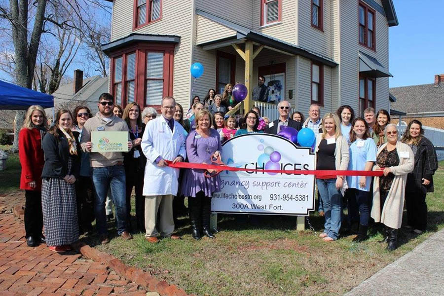 Donna Malone cuts the ribbon on Life Choices' new location in her hometown of Manchester, Tenn., Feb 15, 2017.