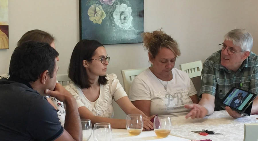 Rev. John Ensor (right) and Jeanne Pernia (second from right) educate Romanian abortion doctors on fetal development, the value of life and the after-effects of abortion for post-abortive women.