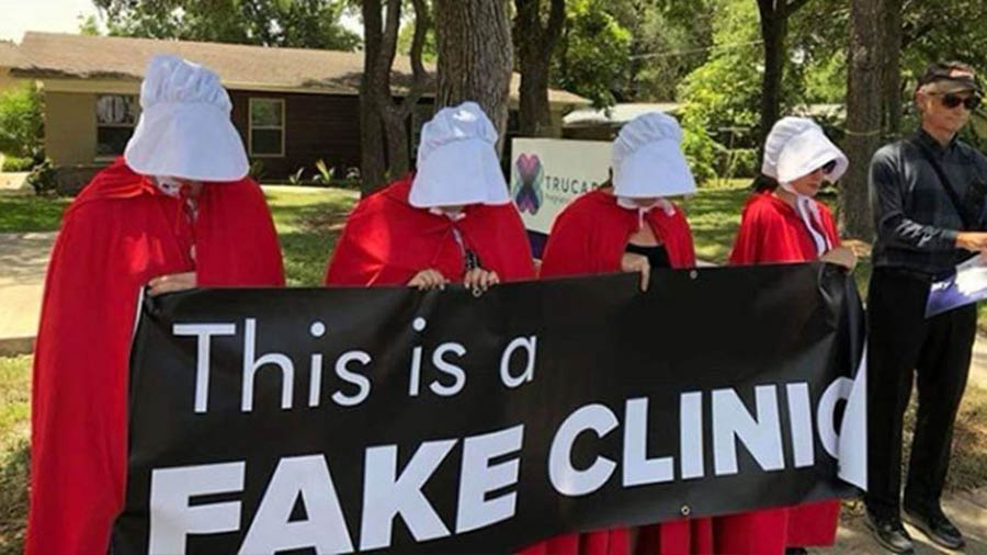 After much hype, a meager four hooded activists came out to protest TruCare Pregnancy Center in Austin, Texas last Tuesday.