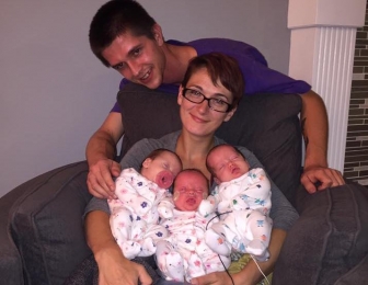 Janey and Dustin with their three newborn babies in September, 2017.