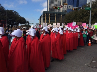 &quot;Texas Handmaids&quot; demonstrating their opposition to non-abortive pregnancy options in Austin, Texas