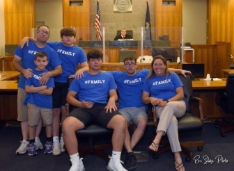 Rita Marlow and Seth Lentchner&#039;s family at their adoption of Nate Ross